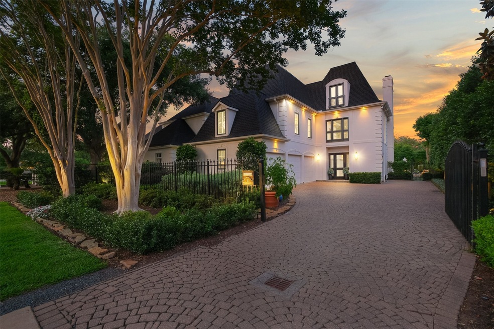 Spectacular custom home with gated access and 3 ca