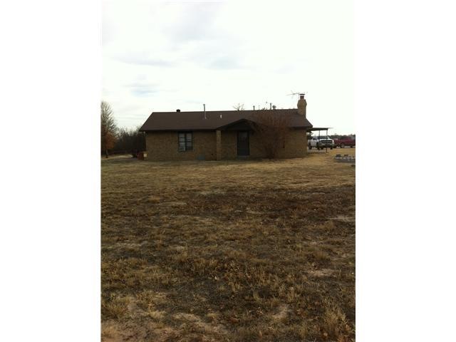 Exterior Front. Cute home that sits atop a little 