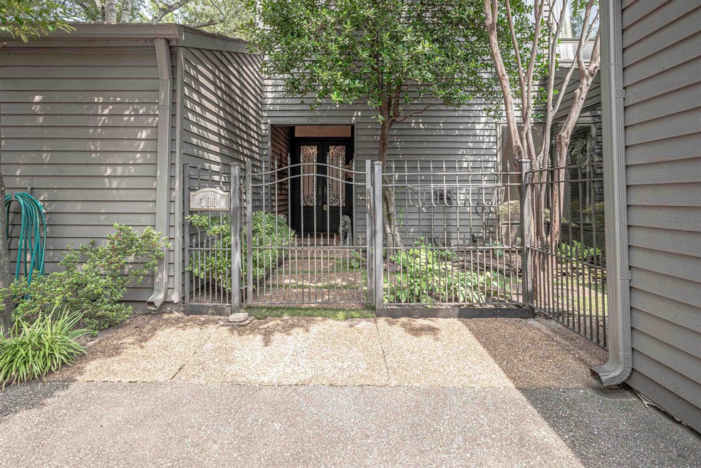 Doorway to property featuring a gate