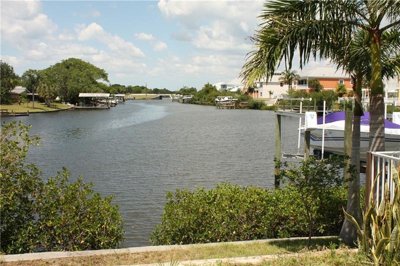 VIEW OF CANAL AND AVAILABLE SPACE FOR DOCK AND BOA