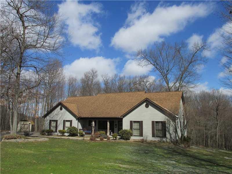 Exterior Front. Private setting, curb appeal, and 
