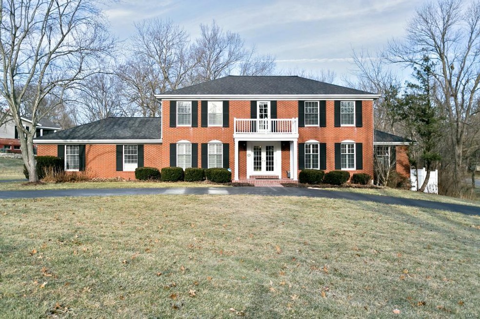 Welcoming Traditional brick front elevation