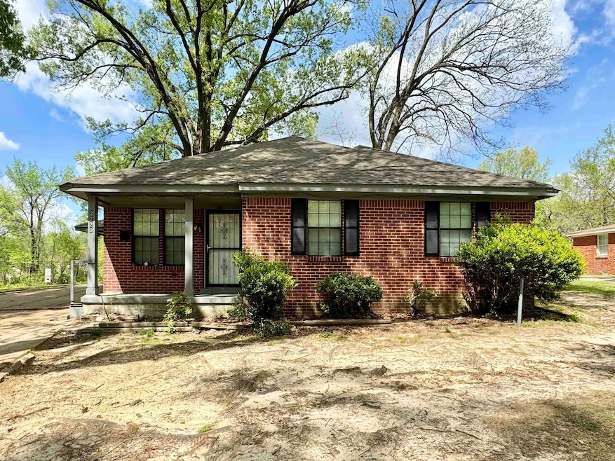 View of front of house with roof with shingles and