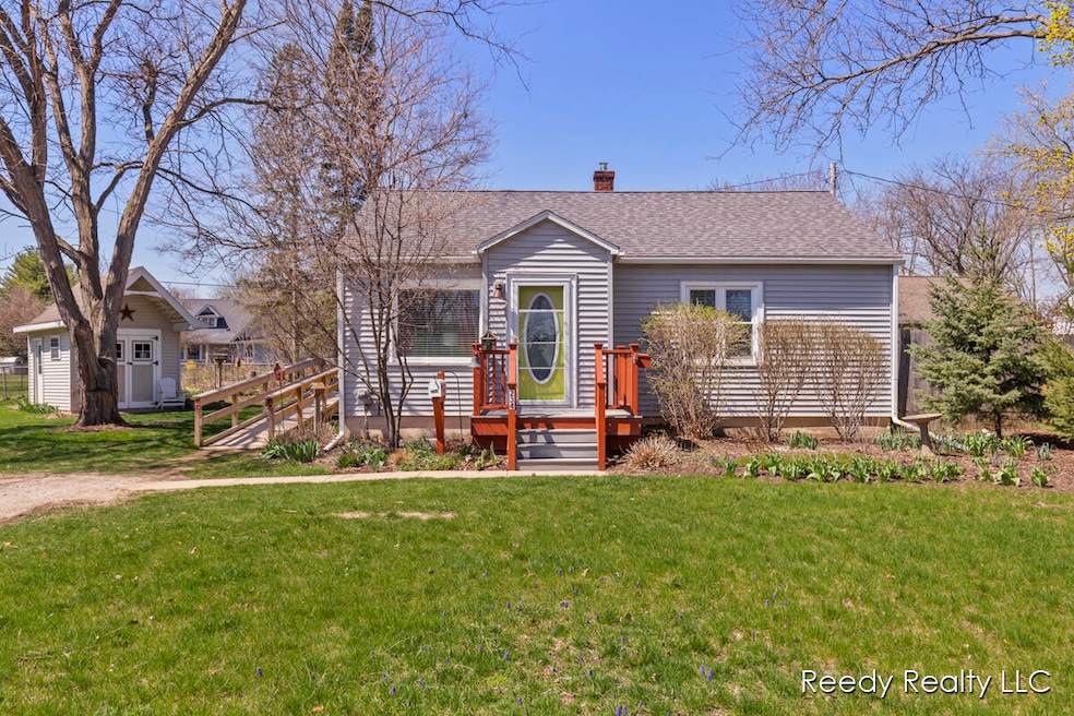 234 Maple St, Lowell, MI 49331 - photo 1