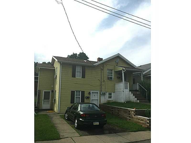 Exterior Front. level Lot and each place has an en