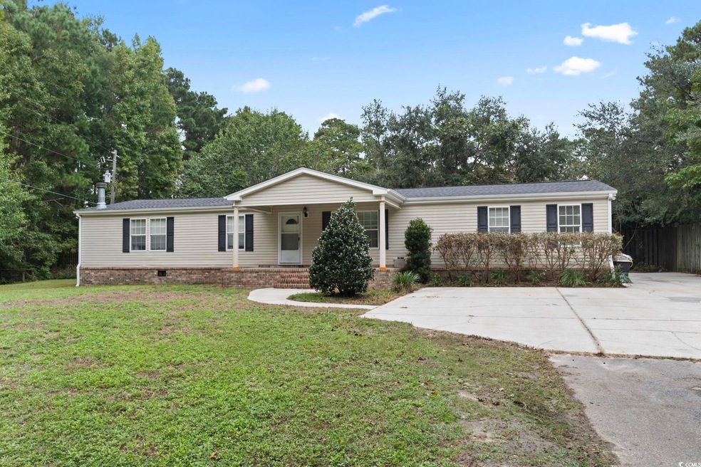 View of front of house with a front yard