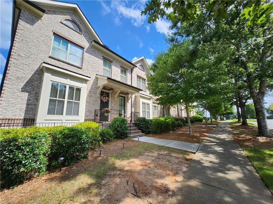 View of front of property with brick siding