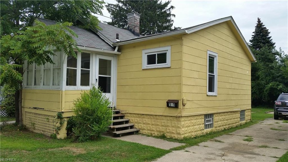 Front View of home showing Enclosed front Porch