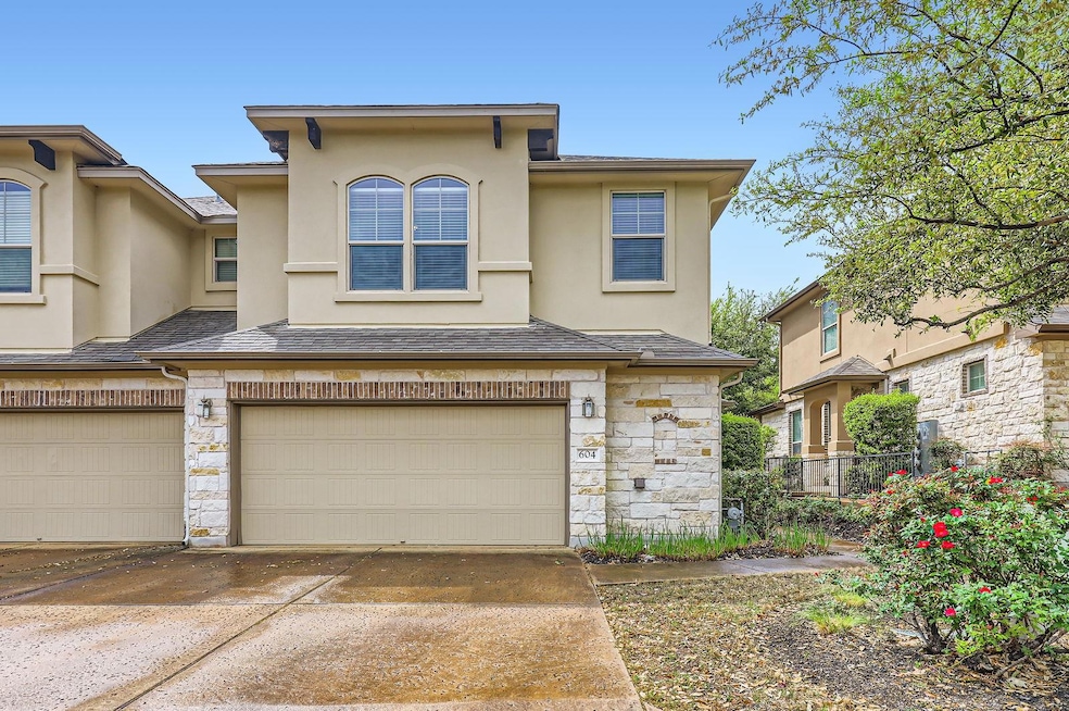 View of front of home with an attached garage, dr