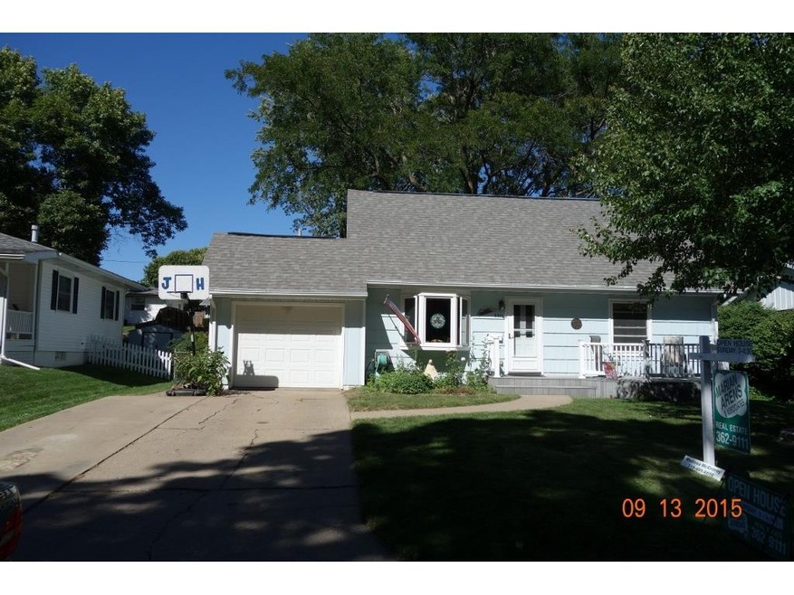 Front Ext showing widened driveway and nice roof.