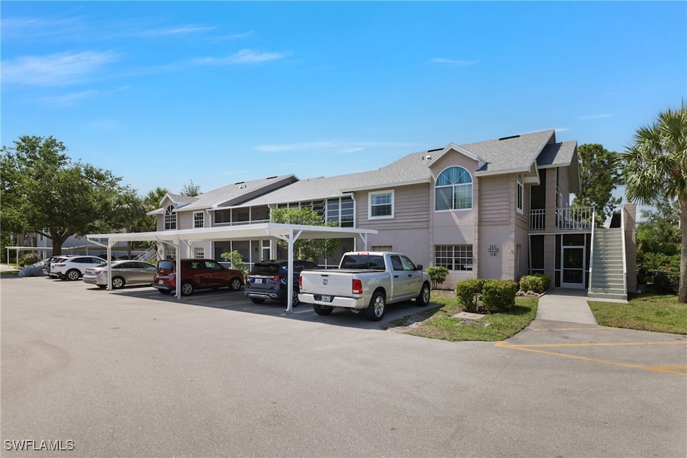 View of front of property featuring covered and un