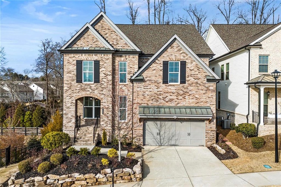 Beautiful curb appeal with extensive upgraded land