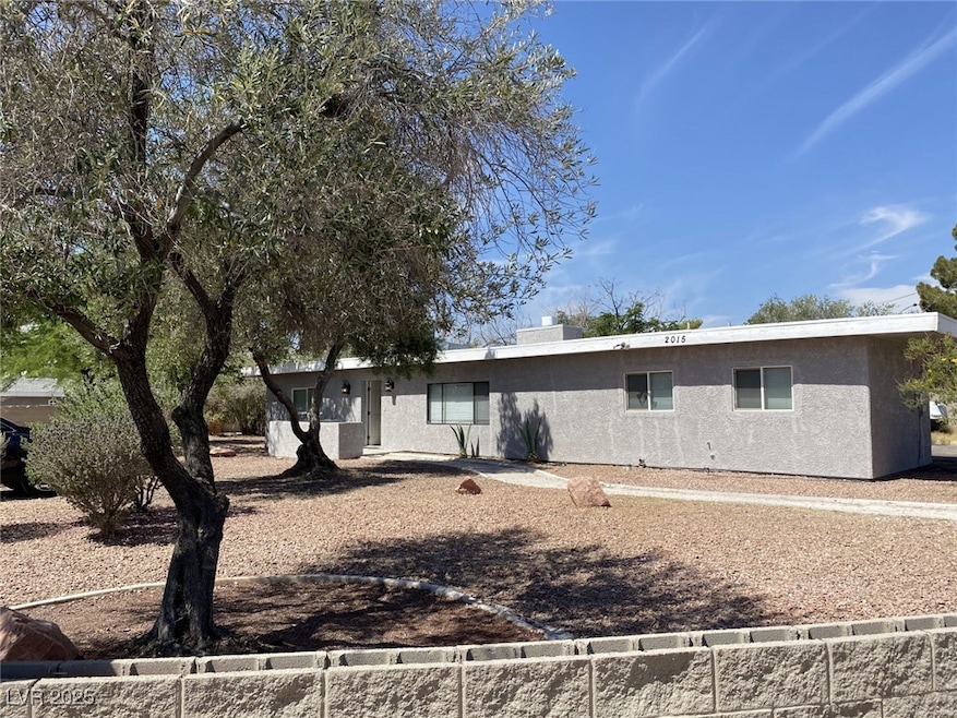 Single story home with stucco siding