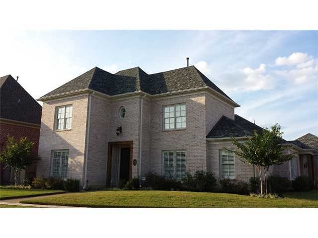 All brick home on corner lot in the Enclave!