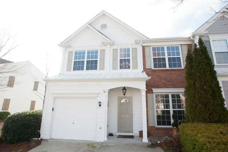 Exterior Front. Impressive 3 BR/2.5 BA Townhome