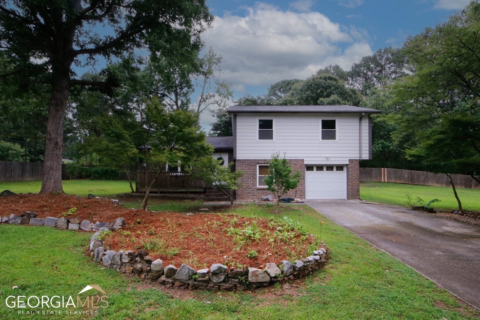 1168 Shady Ln SW, Lilburn, GA 30047 - photo 1