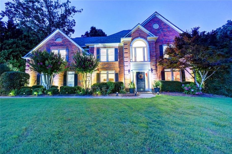 Lovely brick and concrete siding home located on l