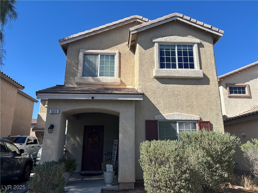 View of front of home with stucco siding