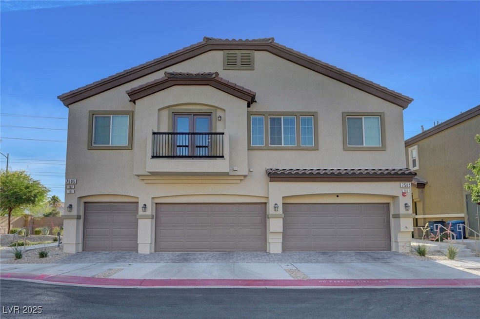 View of front of property featuring a tiled roof,