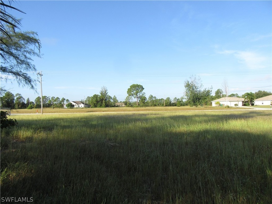 Oversized corner lot with water view!!