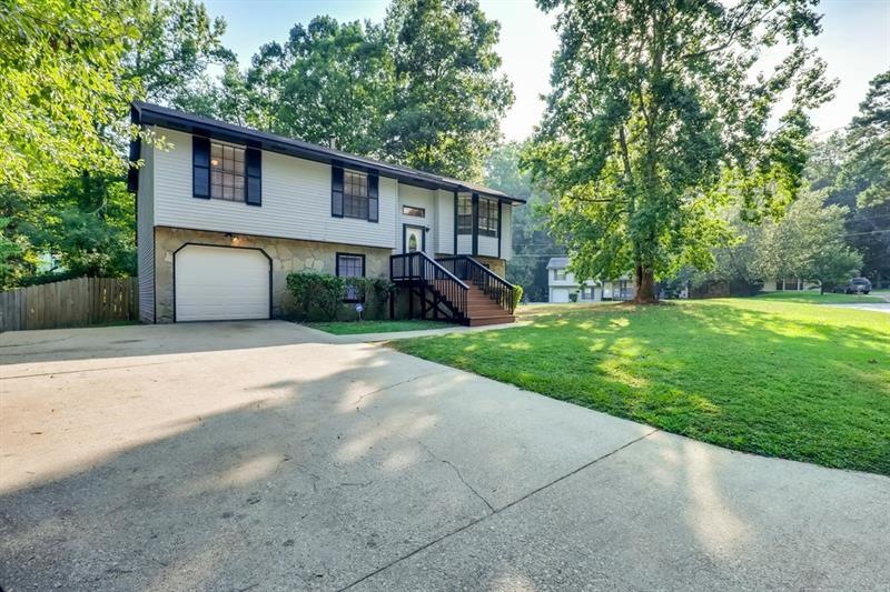 Newly renovated! Larger corner lot with garage and
