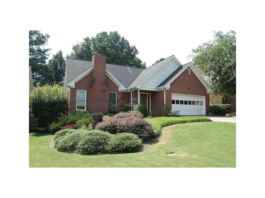 Exterior Front. Gracious 4-sides brick home with g
