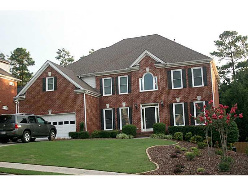 Exterior Front. Beautiful 3 sided brick home in Du