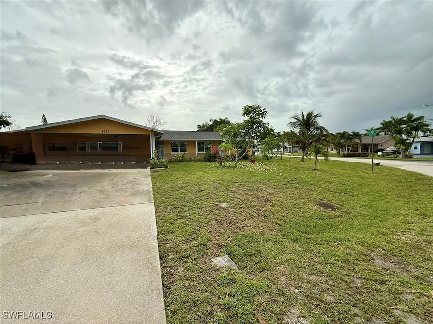 View of front of house with concrete driveway, a c