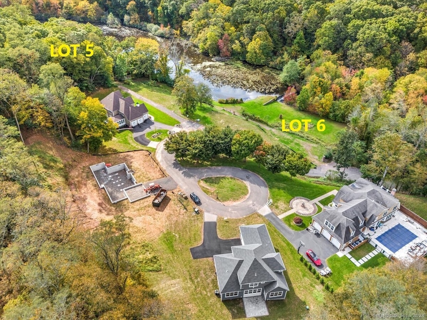 Lot 5 is a waterfront wooded lot