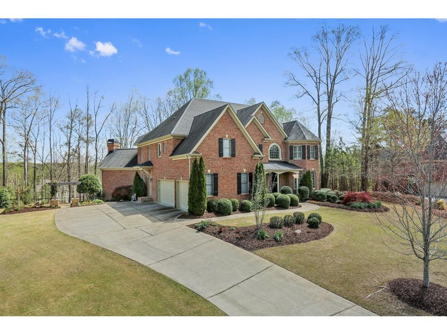 Stately home on a beautiful, flat 1+ acre lot