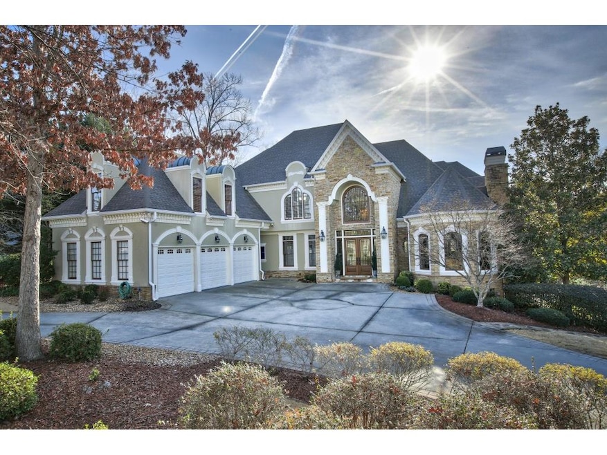 Beautiful European Traditional home sits on a leve