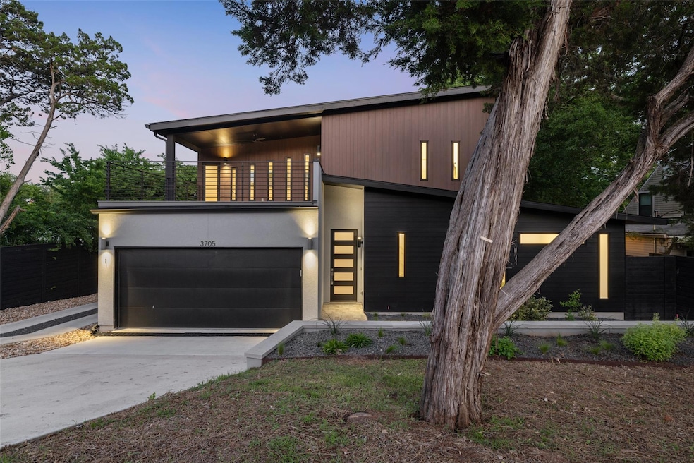 Contemporary home featuring a balcony and concret