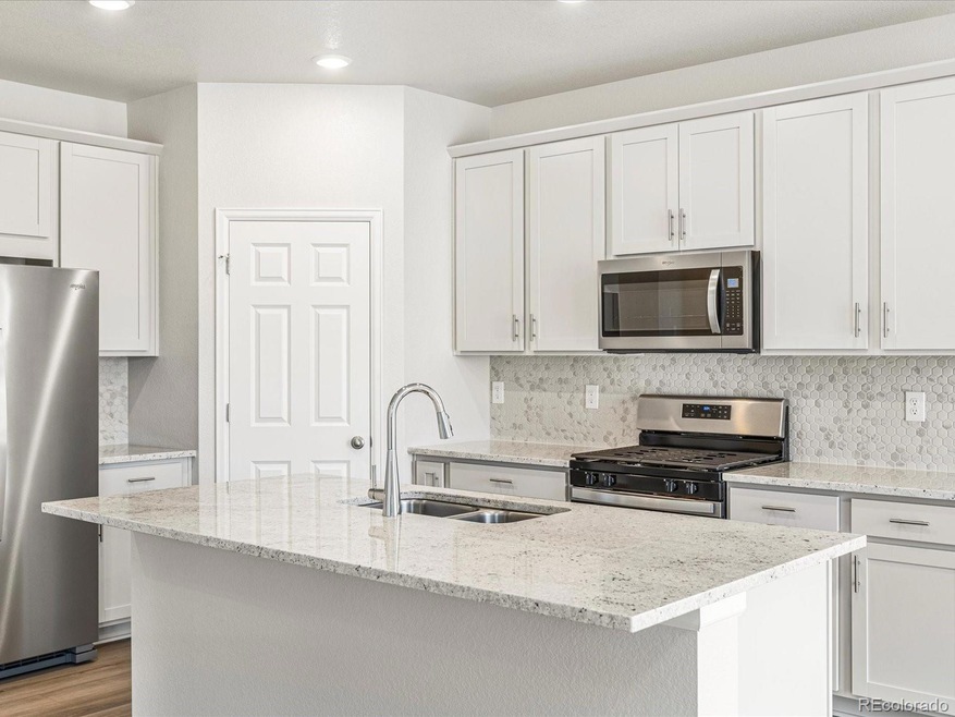 9051 Quintero St, Commerce City, CO 80022 - photo 1