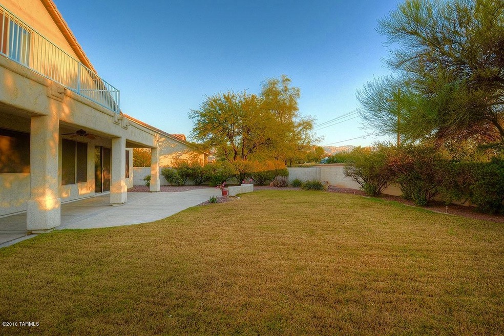 Huge flat walled in grassy yard