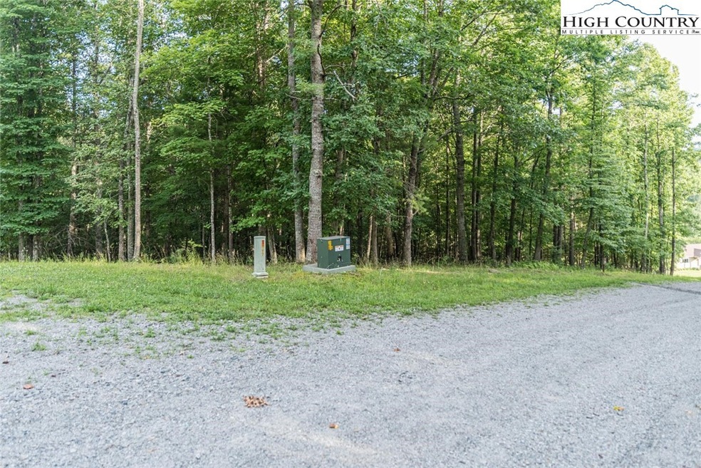 Well laying wooded corner lot.