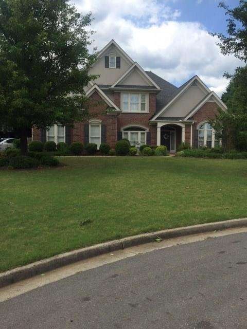 Welcome Home to 7015 Woodview Way!  Beautiful fron