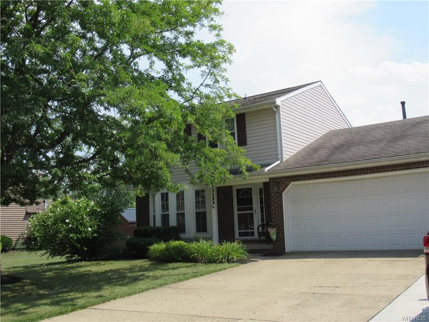 Lovely Colonial.  Double wide concrete drive w/ext