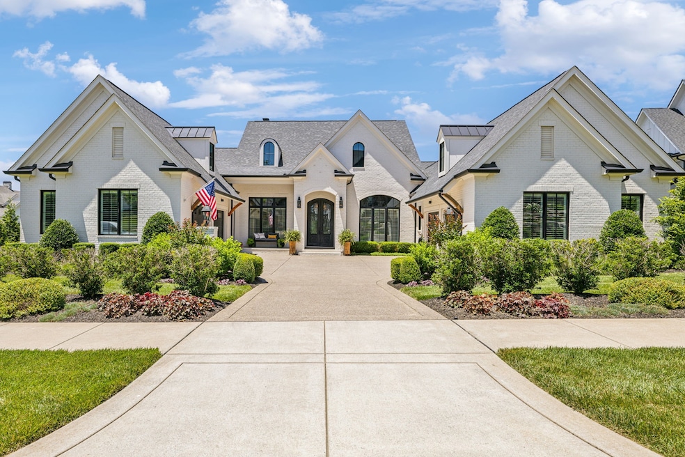 Welcome to 8162 Heirloom Blvd located in The Grove in College Grove, TN.