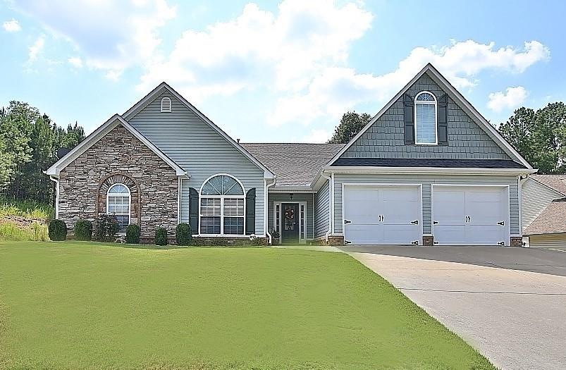 BEAUTIFUL STEPLESS RANCH PROVIDES TRUE ONE-LEVEL L