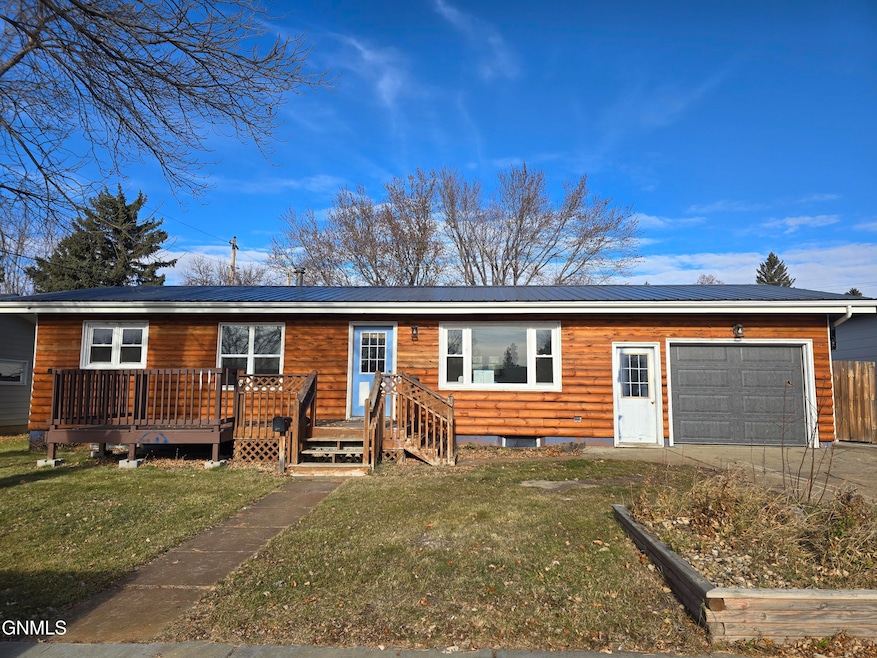 239 Carlson St, Dickinson, ND 58601 - photo 1