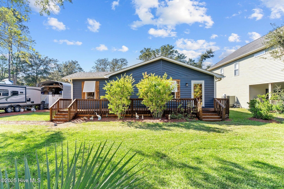 211 NE 55th St, Oak Island, NC 28465 - photo 1