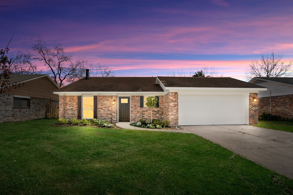 New Landscape frame the new curved walkway and freshly painted exterior