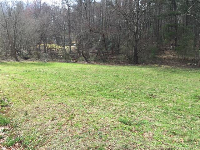 Level easy build site in Laurel Park with public w