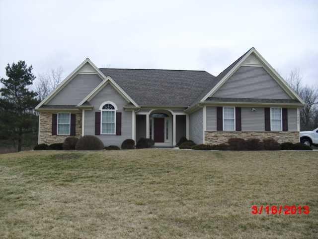 Exterior Front Stunning custom built ranch fully l