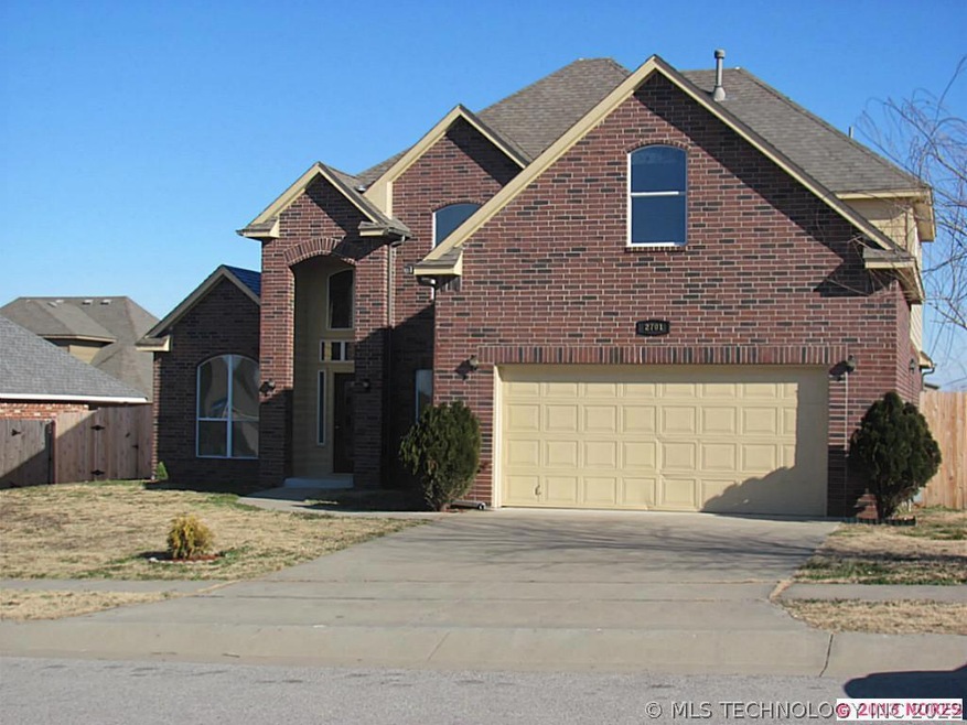 Full Brick, full privacy fence, covered patio. No