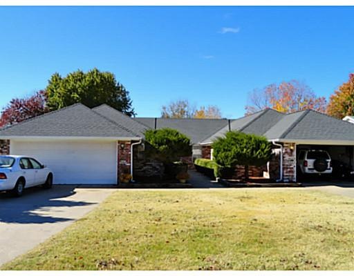 Exterior Front. Double garages - 3 bedrooms - fenc