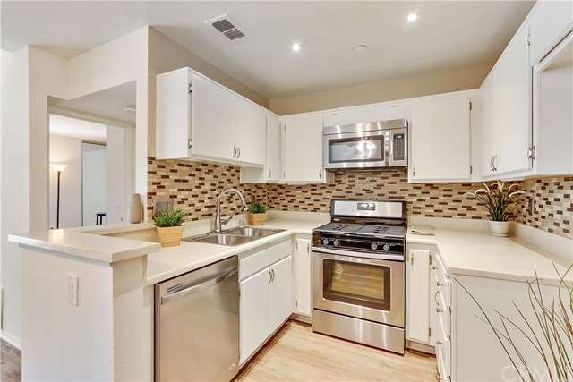 Beautiful kitchen with recessed lighting with new 
