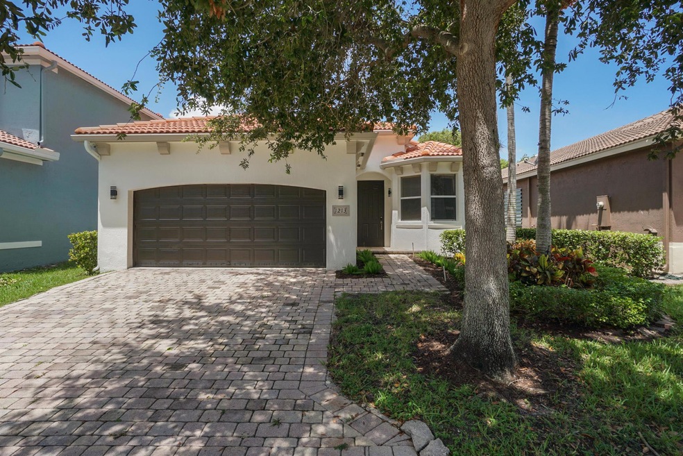 1213 Rose Gate Blvd, Riviera Beach, FL 33404 - photo 1