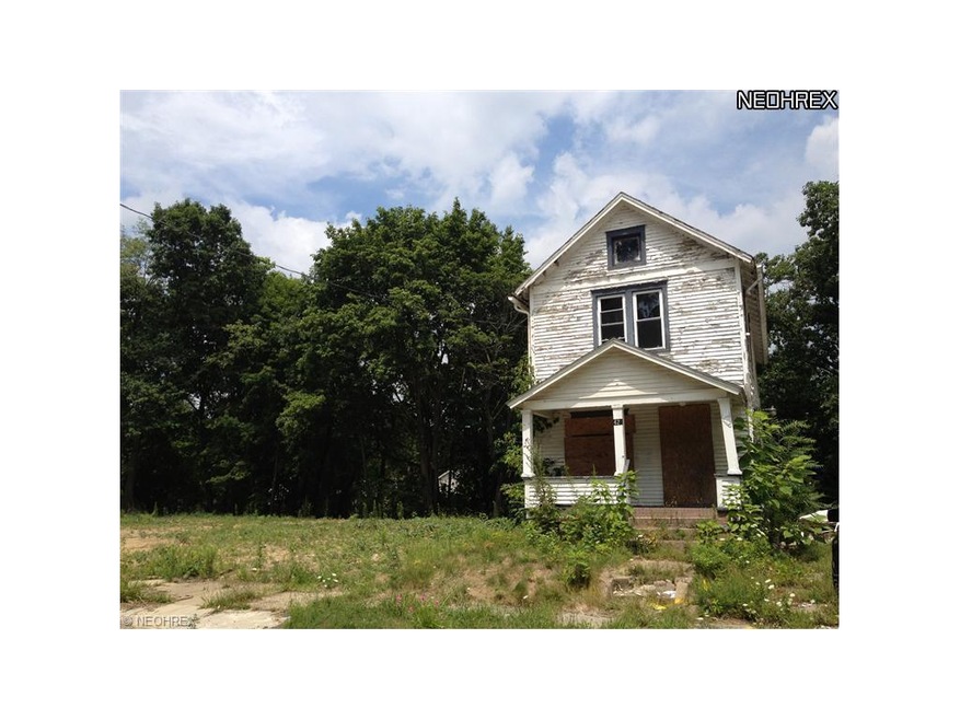 Neighboring vacant lot on left.