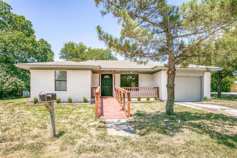 This home is handicap accessible and has a darling front porch area.